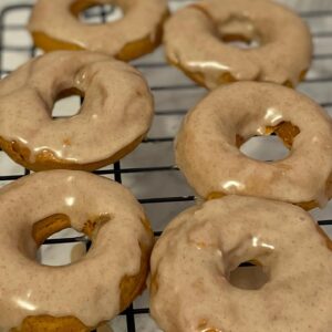 Pumpkin Doughnuts with Maple Frosting